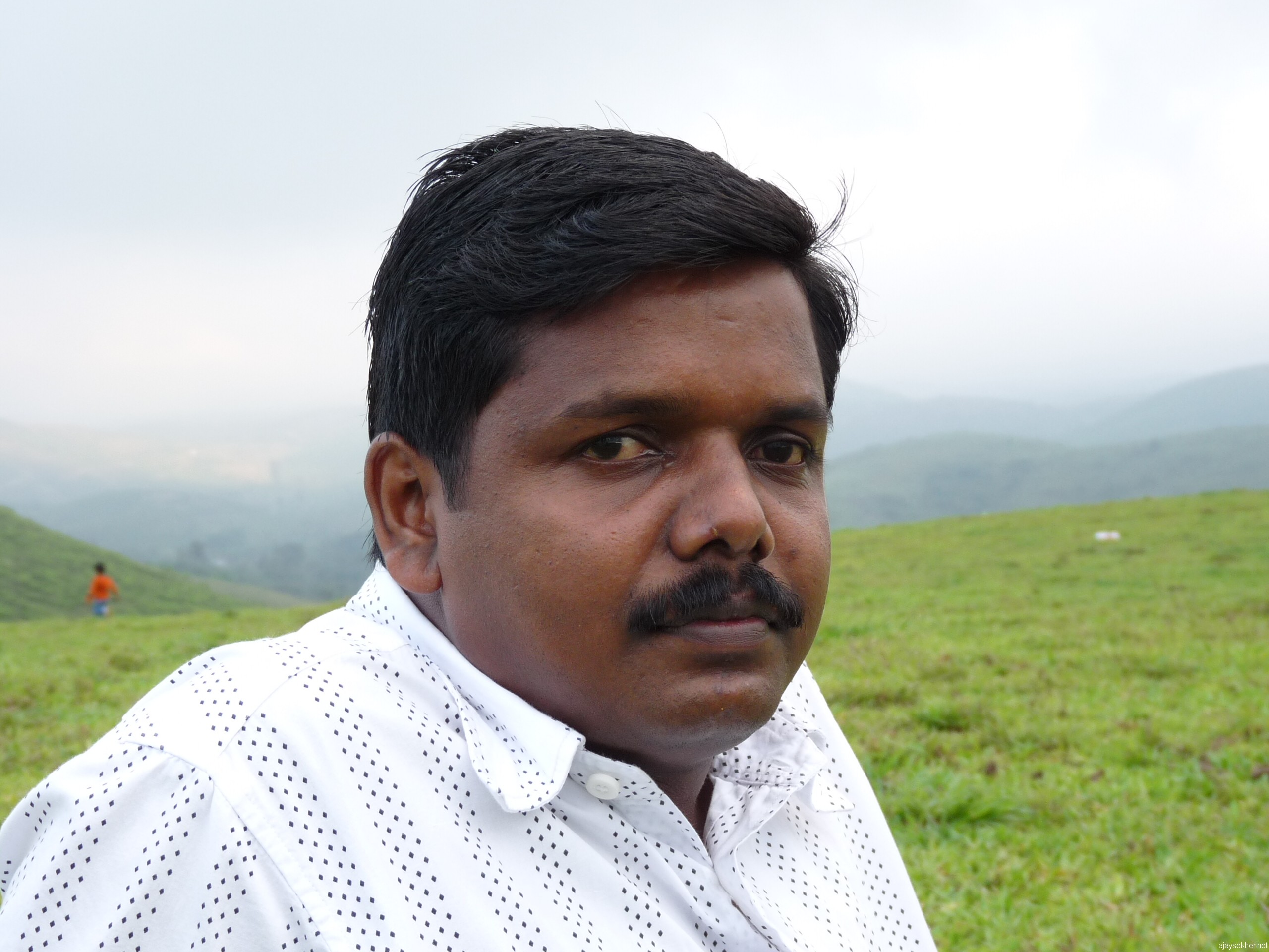 Santhosh O K on the grass hills of Vagaman in Apl 2011 