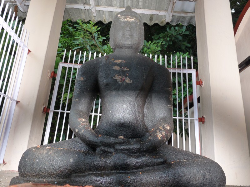 Tenth century granite Buddha at Pallykal Bharanikavu