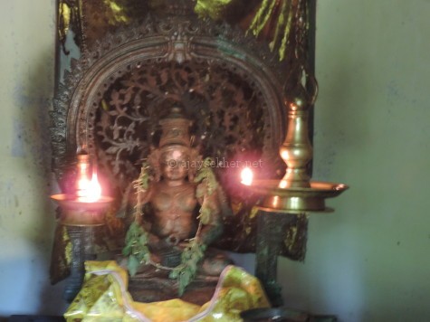 Buddha bronze in Mahayana style with the ornamental crown Ushnisha and Bodhi tree in the backdrop Prabha, now worshiped as Krishna in Kilirur temple, Kottayam.