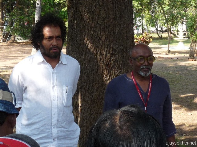 Riaz Komu and Bose Krishnamachari the curators of Biennale addressing the people at Aspinwall House.