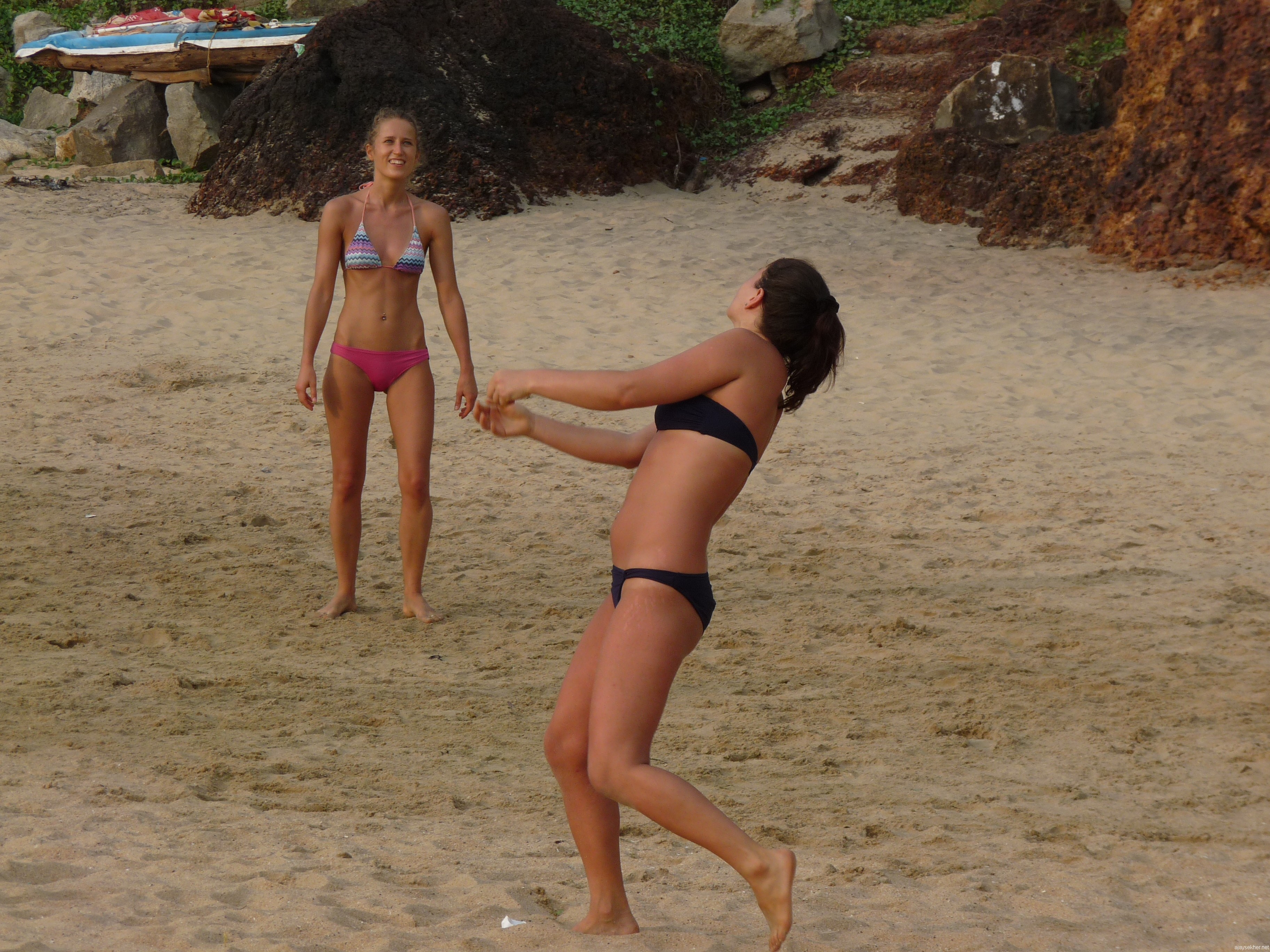 Playing Christmas: Women in action in beach volleyball at Papanasam, Varkala on 2012 Christmas day.