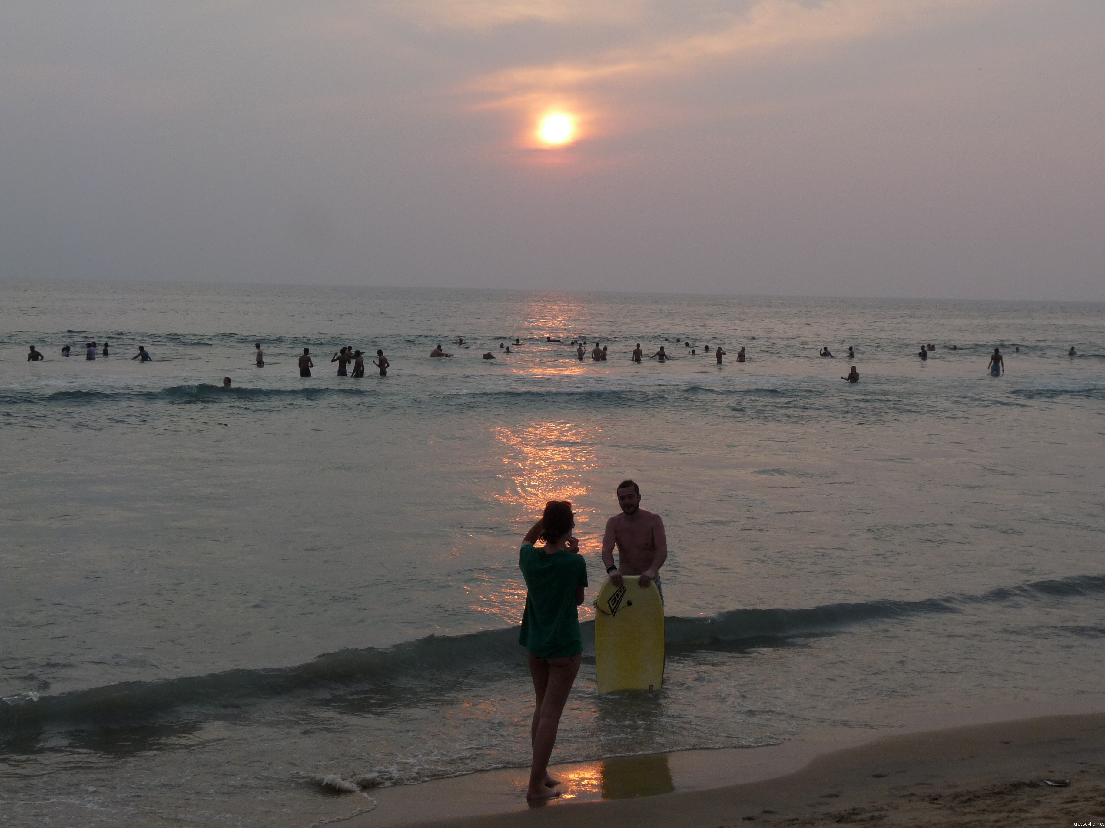 A couple from alien shores: Sunset at Papanasam beach, Varkala.  2012 Christmas comes to an end...