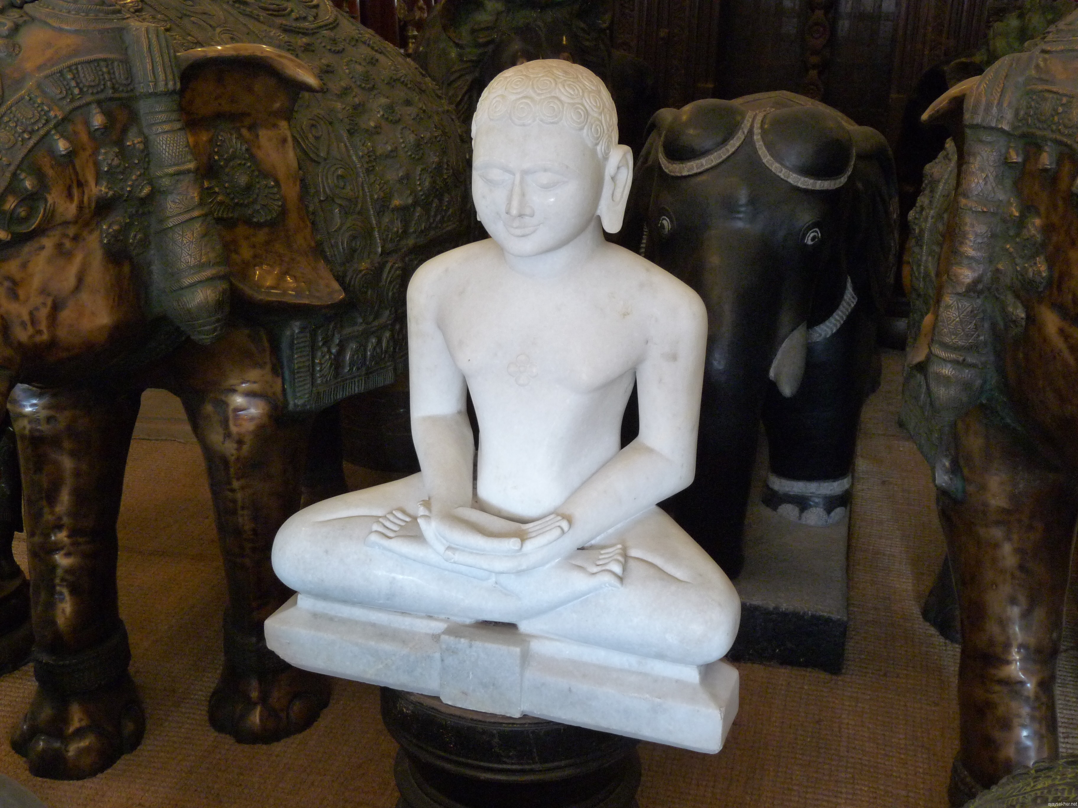 A Jina in white marble on display in an antique shop in Jew Town, Mattanchery.
