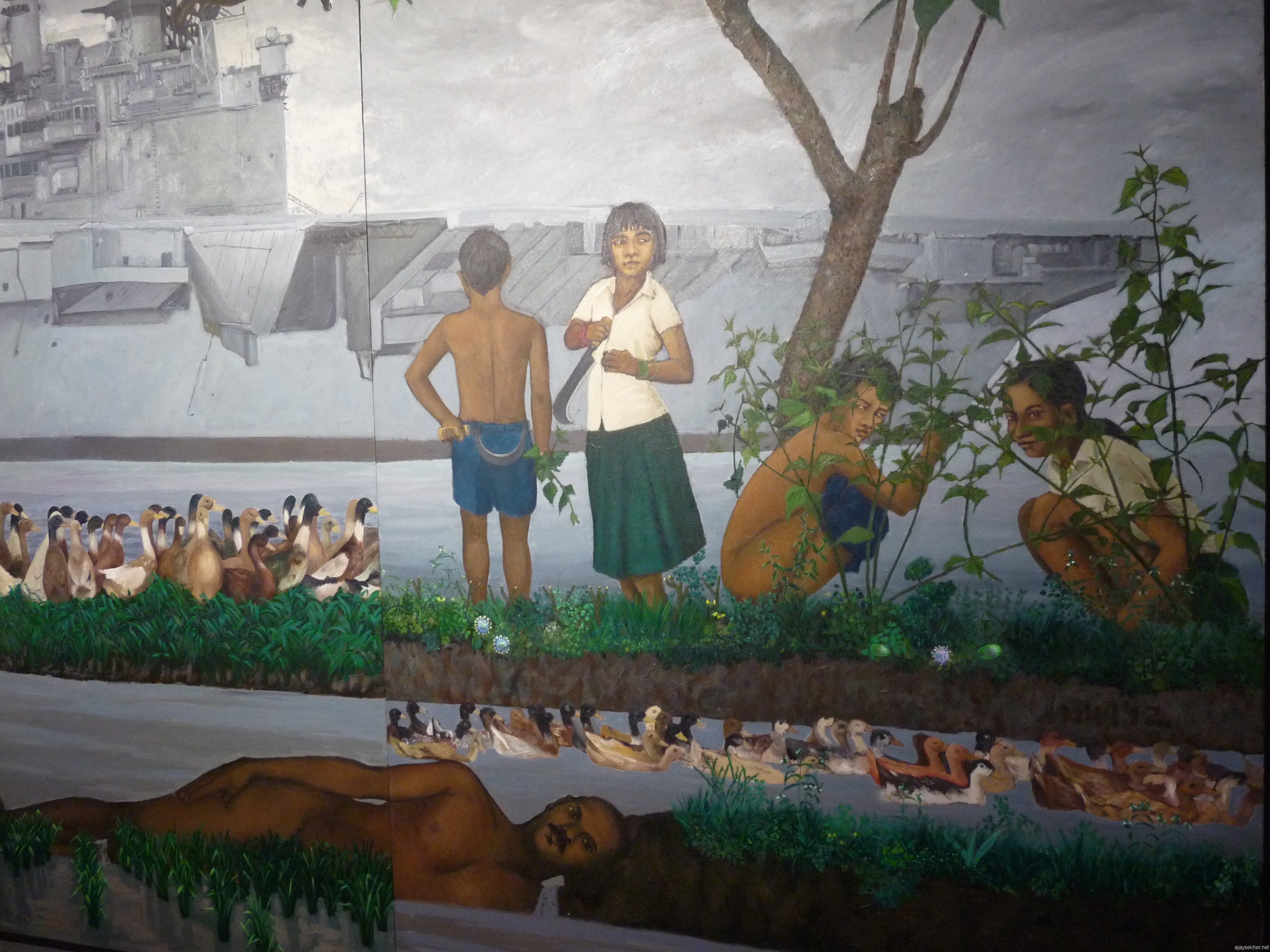 Detail from K P Reji's Thoombinkal Chathan.  See the life in the periphery still and the persistent presence of the past in the present, rendered through live imagery.
