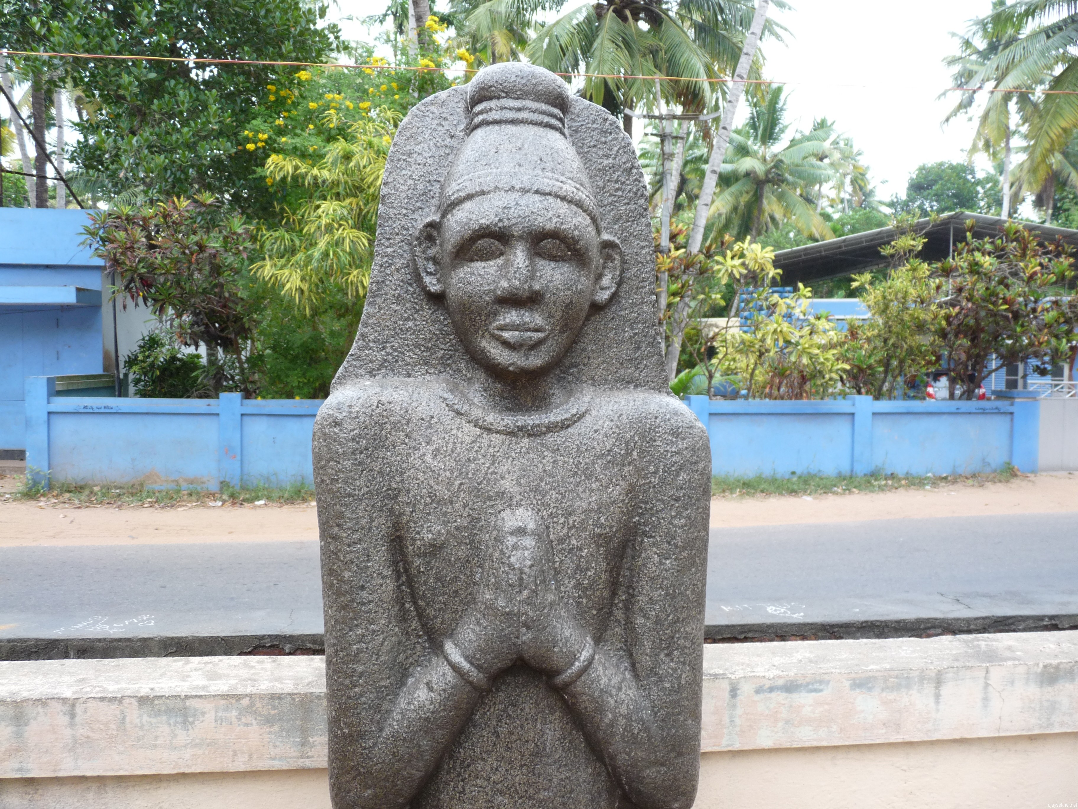 Granite idol at Kayikara now installed at the gate of Asan memorial.  Can be identified as a Siddha of Vajrayana or Tantric Buddhism in Kerala. 26 Dec 2012