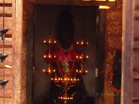 The main and big idol relic of Muruka at Trikaipata shrine Calicut.  The limbs below the knee and hands are lost.  The neck is also broken.  The face is obliterated. The head gear and ornamented hairdo clearly connects it to the Boddhisatva figures and iconography associated with Mahayana Buddhism in south India.  Murukan or Andavan was a Bala Boddhisatva before being appropriated into the Hindu Saivite pantheon as the son of Siva.