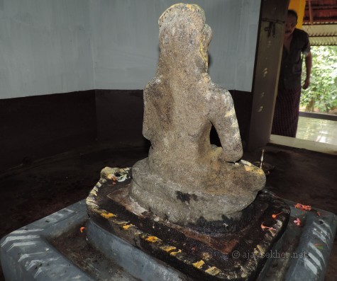 Buddha at Topil in Onampally or Onampilly near Kalady.  Iconographically similar to Buddha idols recovered at Mavelikara, Karumady, Kayamkulam, Kottapuram and Pattanam.  Mr Padma Prabha whose Topil house shrine houses it is also seen. 16. 8. 2014 by Ajay Sekher
