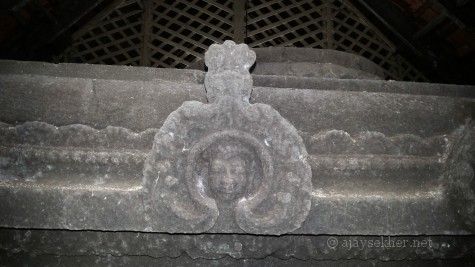 Human face within the dragon motif on the altar at Uliyanur Tevar temple. Dragon was a key Buddhist iconographic element highly popular in China, Tibet and other South Asian regions.  Dragon iconography is a shared Buddhist legacy of Asia. "Vyali Mukham Vachu Teerta Valanja Vatil" says Asan in Karuna.