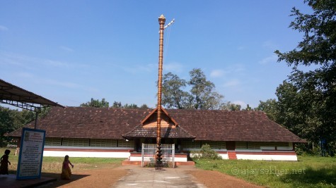 Uliyanur Tevar temple; a view from east. The new metal covered concrete flag post that terminated the traditional rights of the Perum Tachan family is on the front.