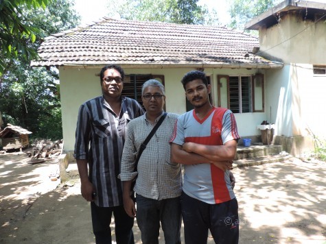The author with Dr Aju K Narayanan and the younger member in the Perum Tachan family at Uliyanur.
