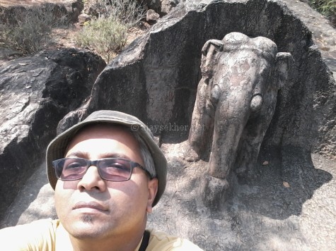 Author Ajay Sekher at Dhauligiri by the Asokan elephant emerging out of the rock; Feb 2015